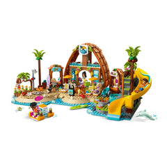 Colorful LEGO Family Vacation Beach Resort set featuring palm trees, a waterslide, and six minidolls engaging in beach activities.