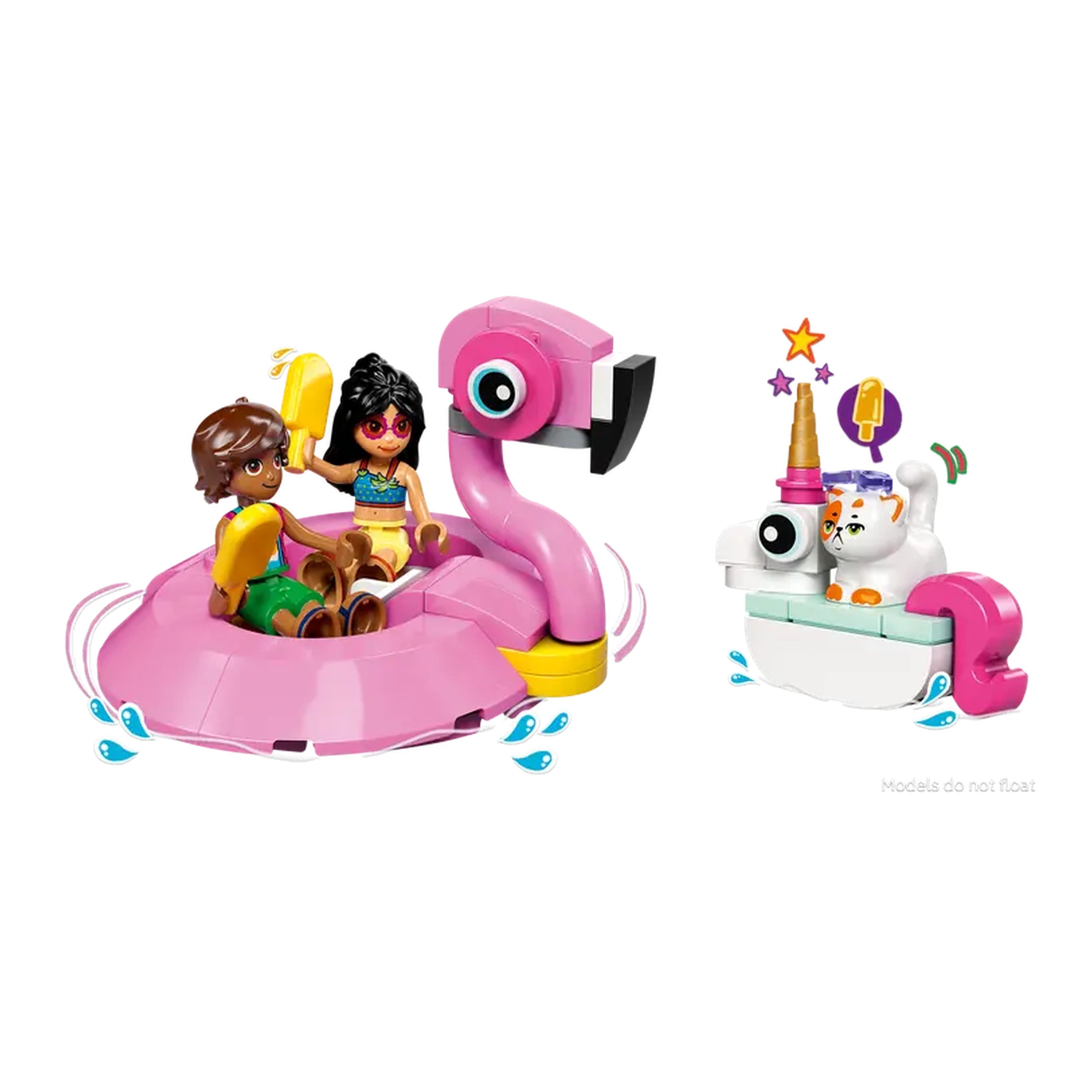 Two LEGO Friends minidolls, Leo and Liann, sit on a large pink flamingo floatie, smiling and holding popsicles. Next to them is a smaller white unicorn floatie with Churro the cat figure, adorned with a horn and colorful accessories. Water splashes around the floaties, enhancing the playful pool party scene.