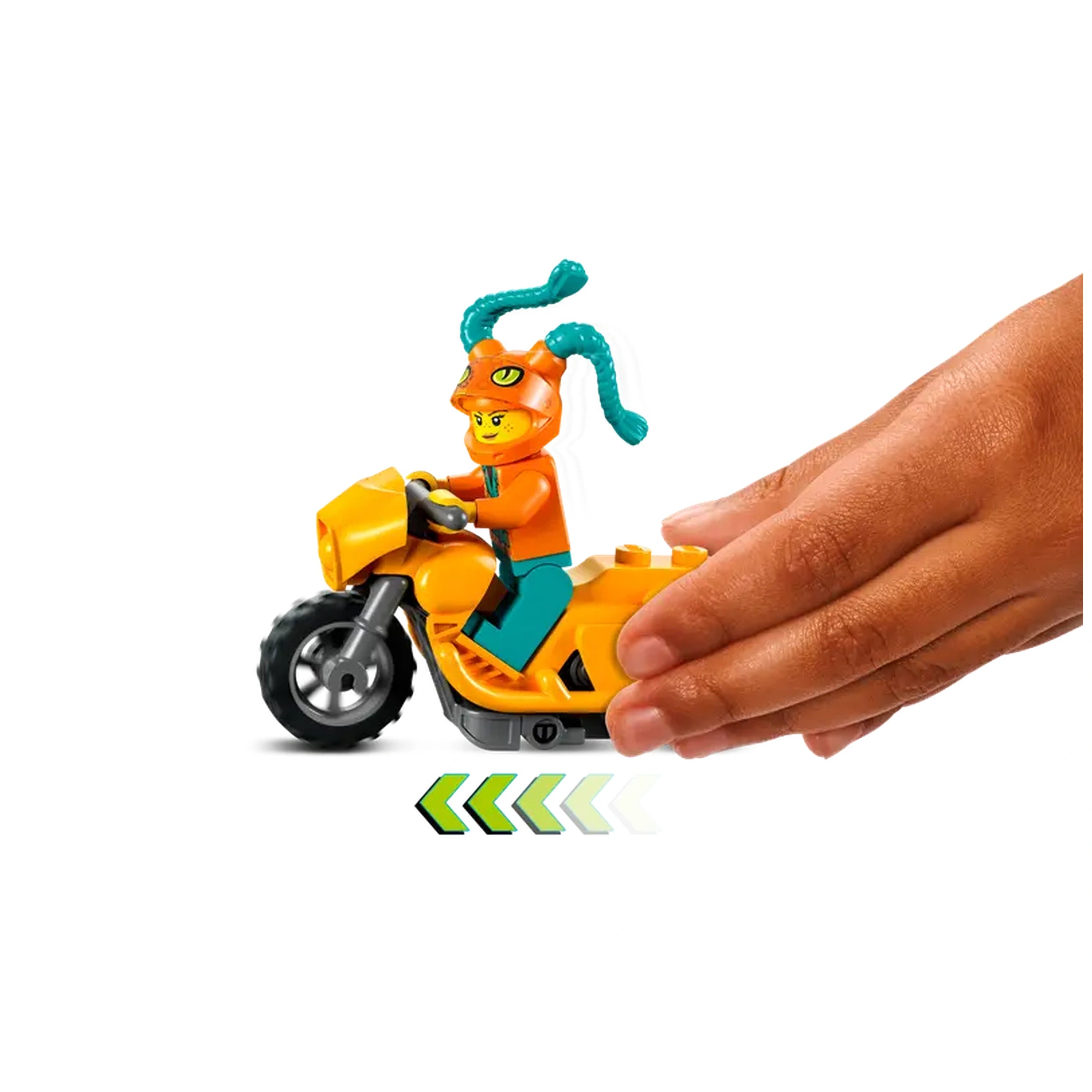 LEGO® minifigure in an orange costume riding a yellow motorcycle, with a hand positioned nearby to demonstrate motion.