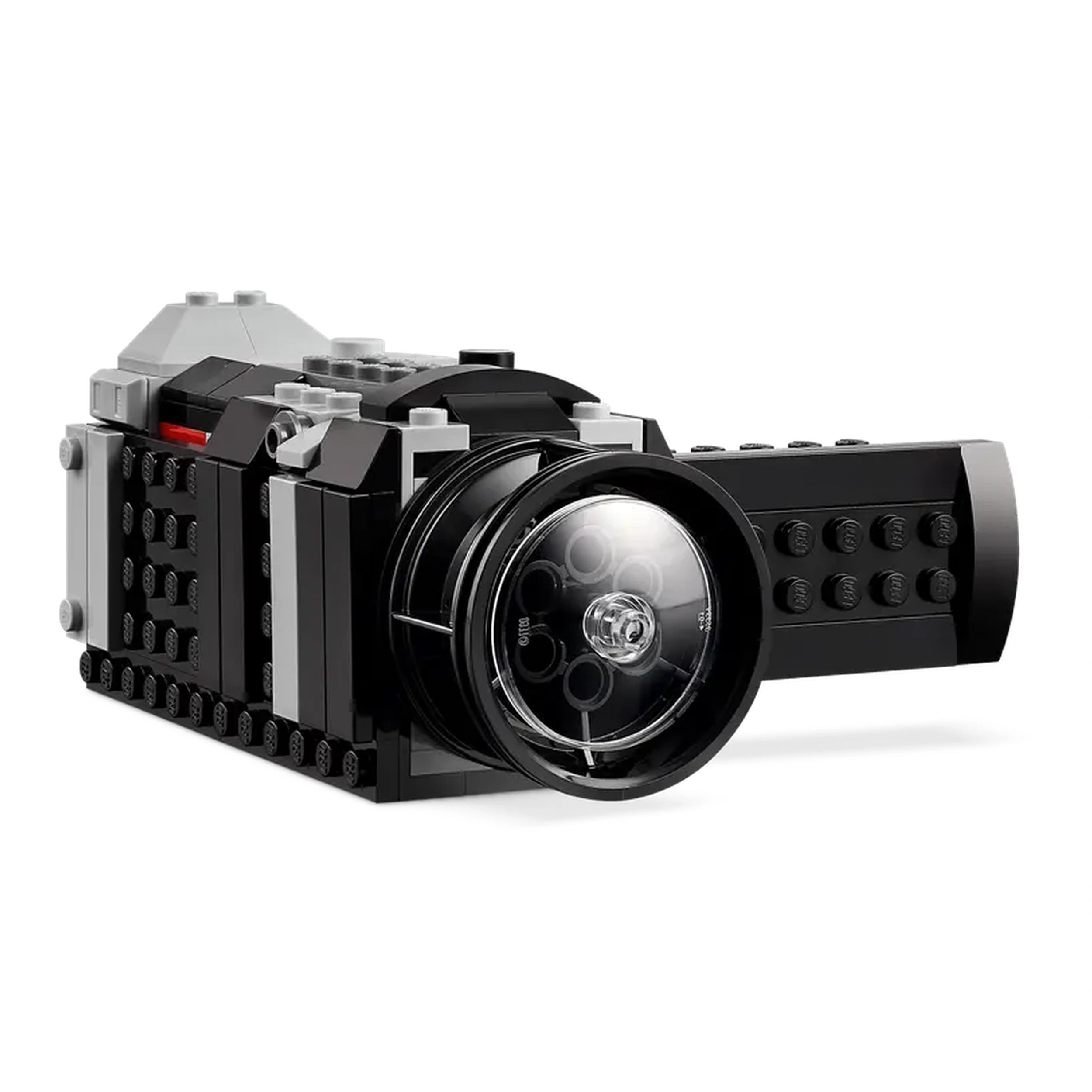 LEGO® Creator Retro Camera with a sleek black design, moving lens, and functional buttons, showcasing a fun, imaginative construction set.