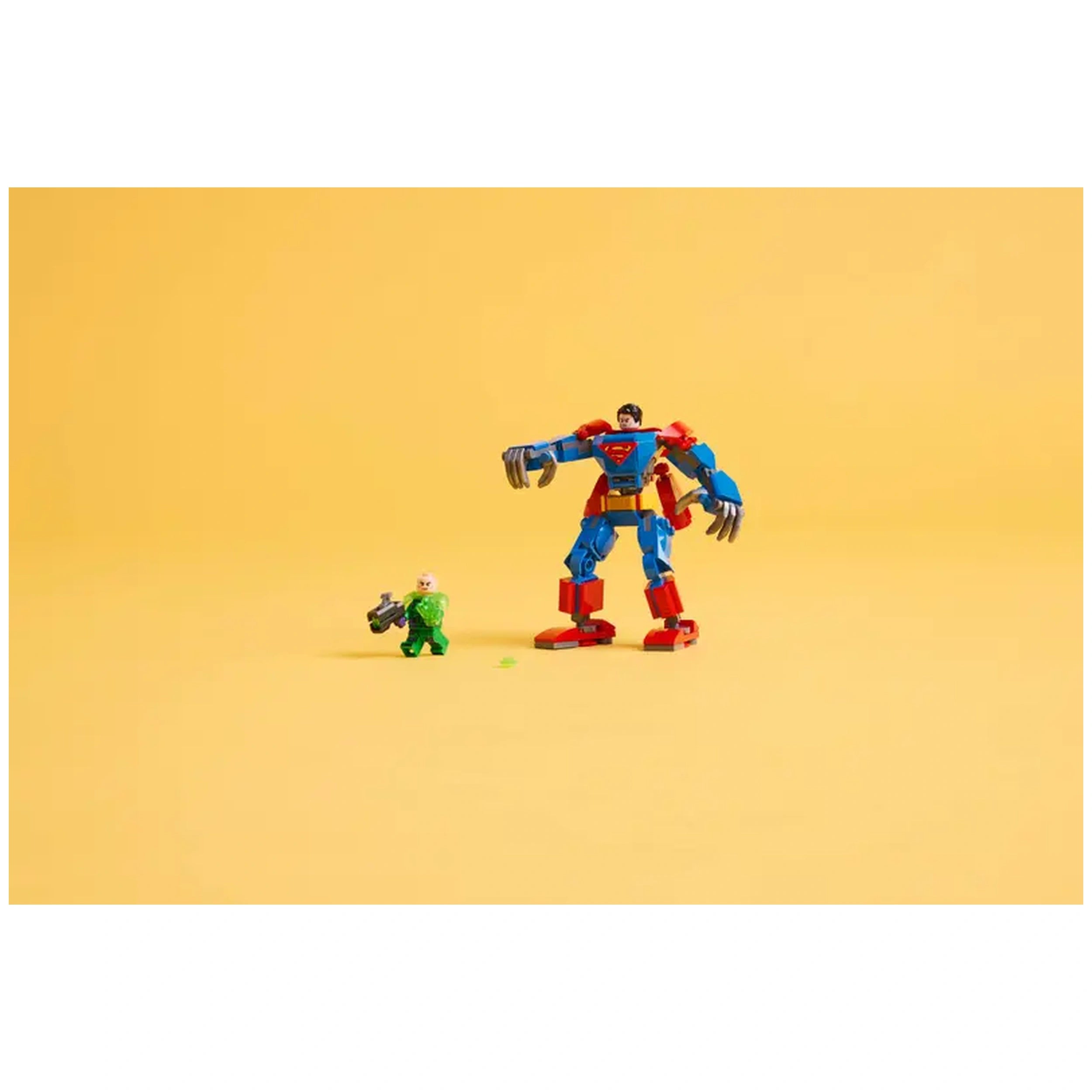 Superman Mech in red, blue, and gray stands next to Lex Luthor in green, both against a yellow background, ready for action.