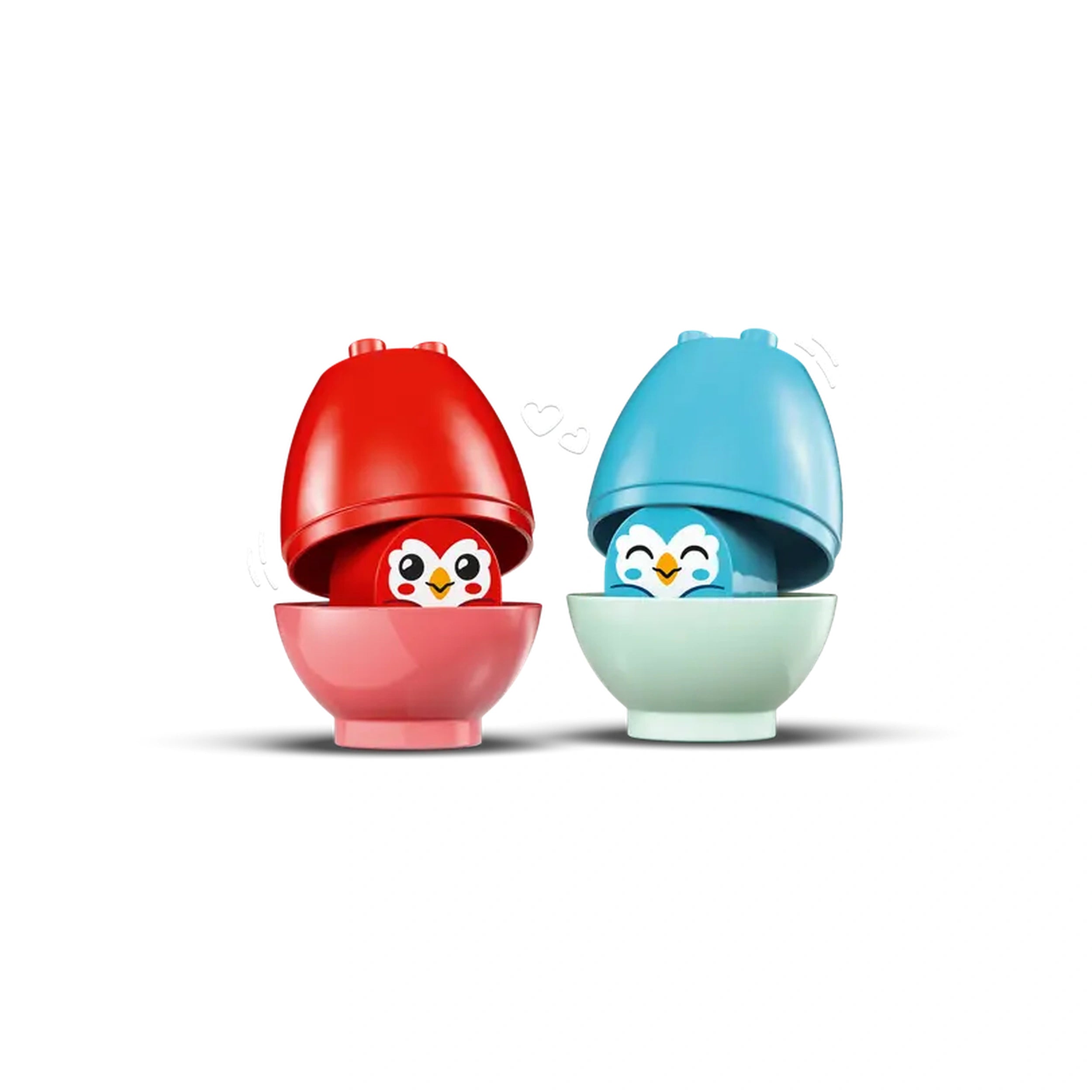 Colorful LEGO® DUPLO® owl figures nestled in red and blue egg-shaped containers, promoting play and learning.