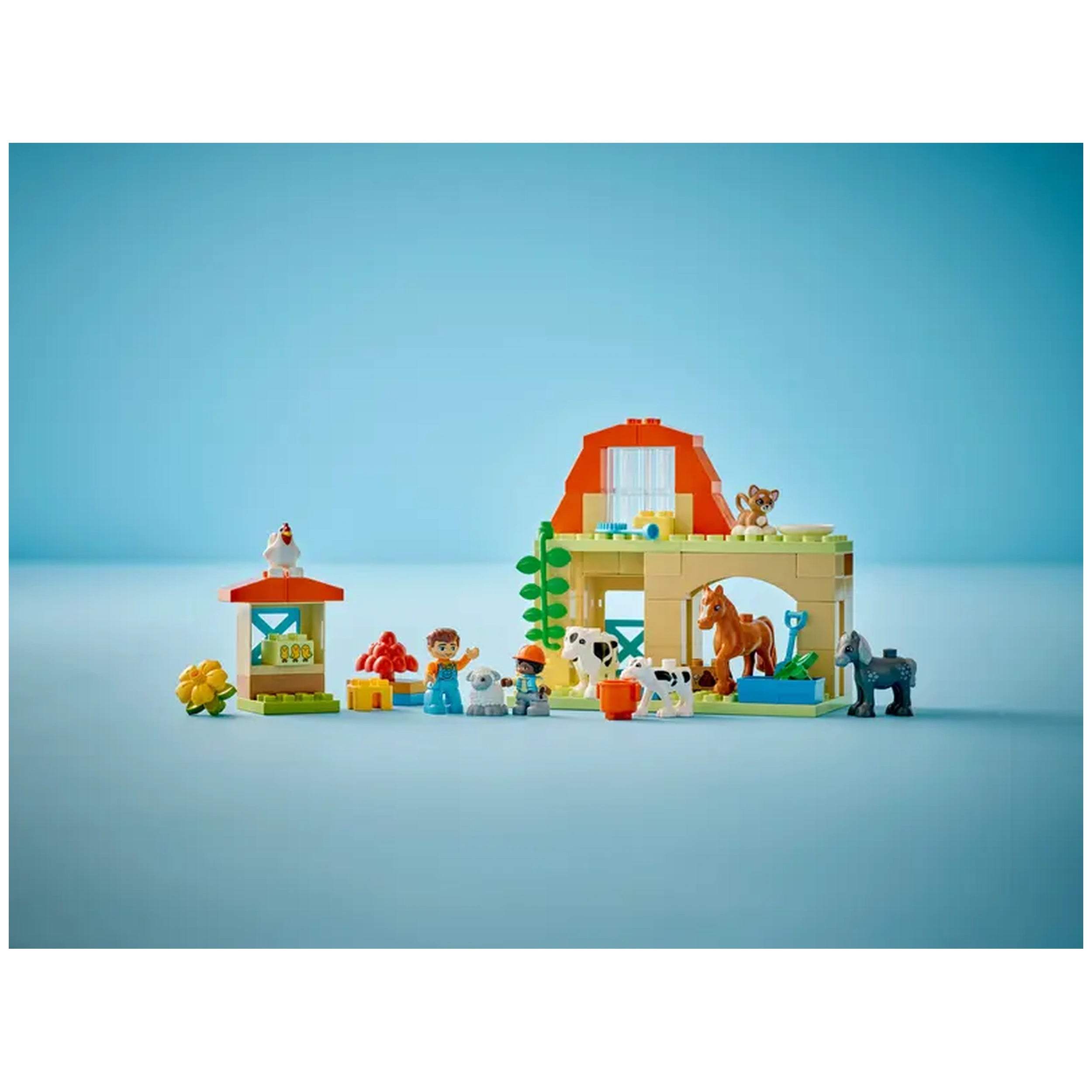 Colorful LEGO® DUPLO® farm set featuring a barn, animals like a horse and cow, and two children interacting joyfully.