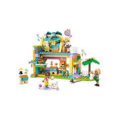 Colorful LEGO® Friends Pet Accessories Shop set featuring three minidolls and various pet accessories, with a playful dog and cat.