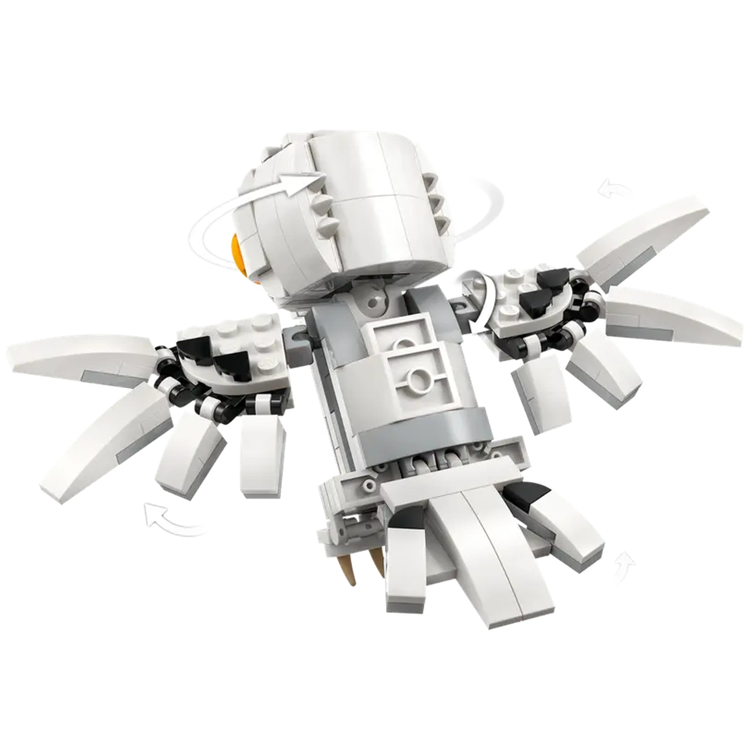 Posable LEGO figure of Hedwig, the snowy owl from Harry Potter, with movable wings, head, and tail, set against a white background.