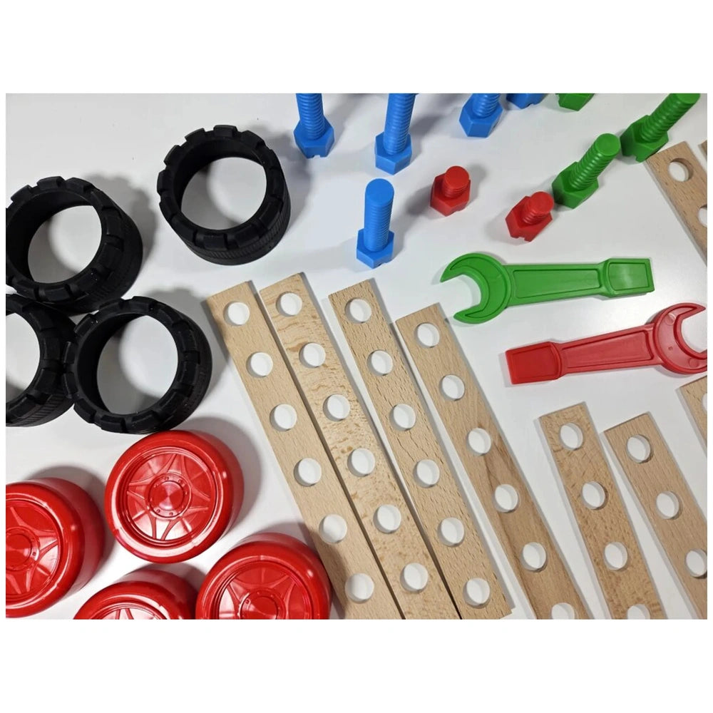 Wooden planks with holes, black wheels, colorful plastic screws, red and green tools from the Alexander Buggy Set.