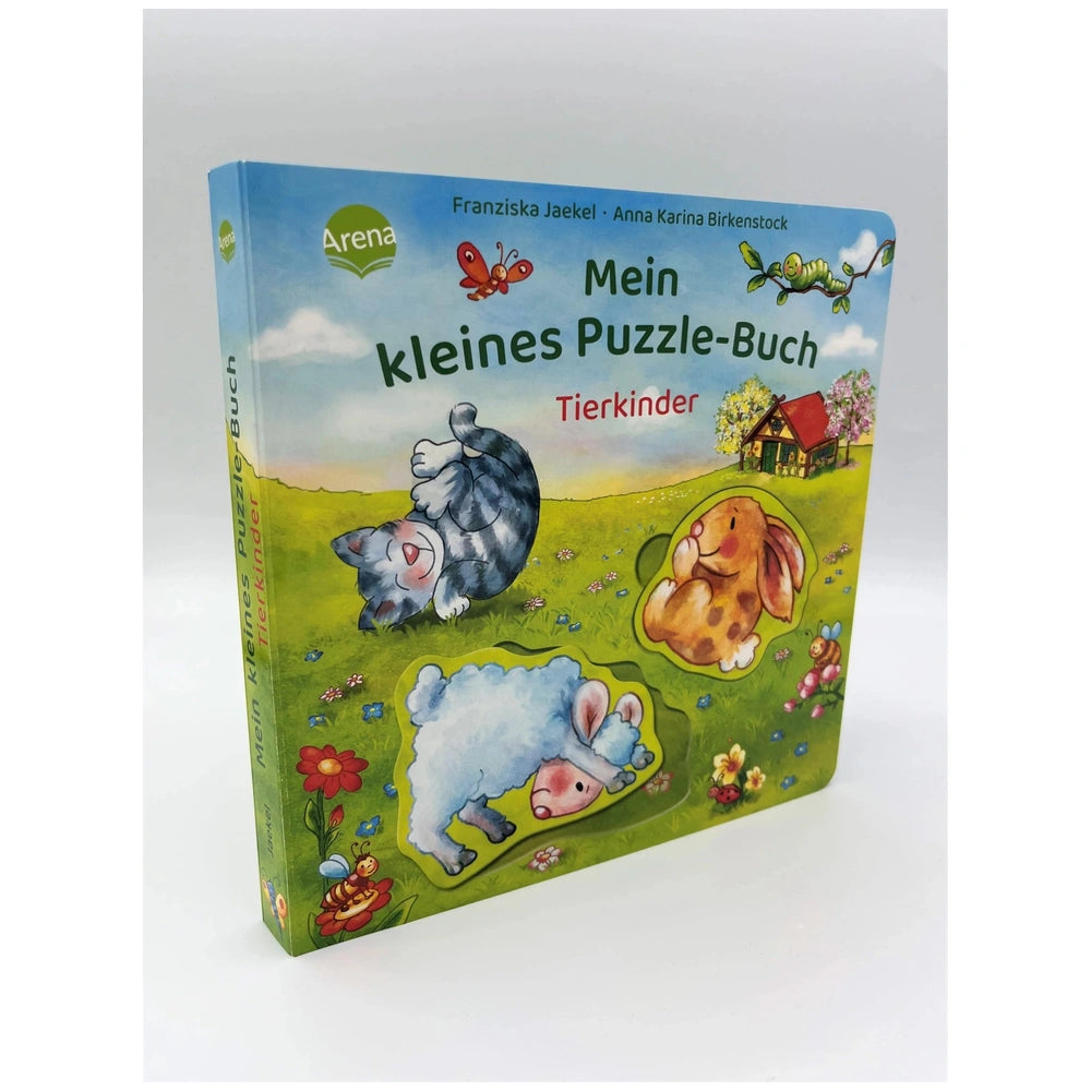 ARENA - Mein kleines Puzzle-Buch cover features colorful cartoon animals in a pastoral scene, designed for young readers.