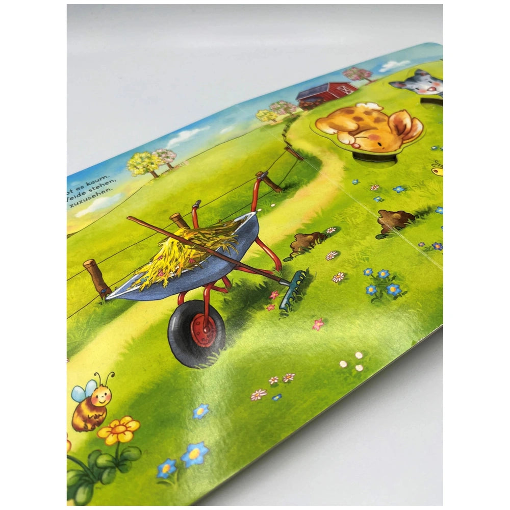 ARENA - Mein kleines Puzzle-Buch cover featuring a colorful cartoon farm scene with a red tractor and hay cart.