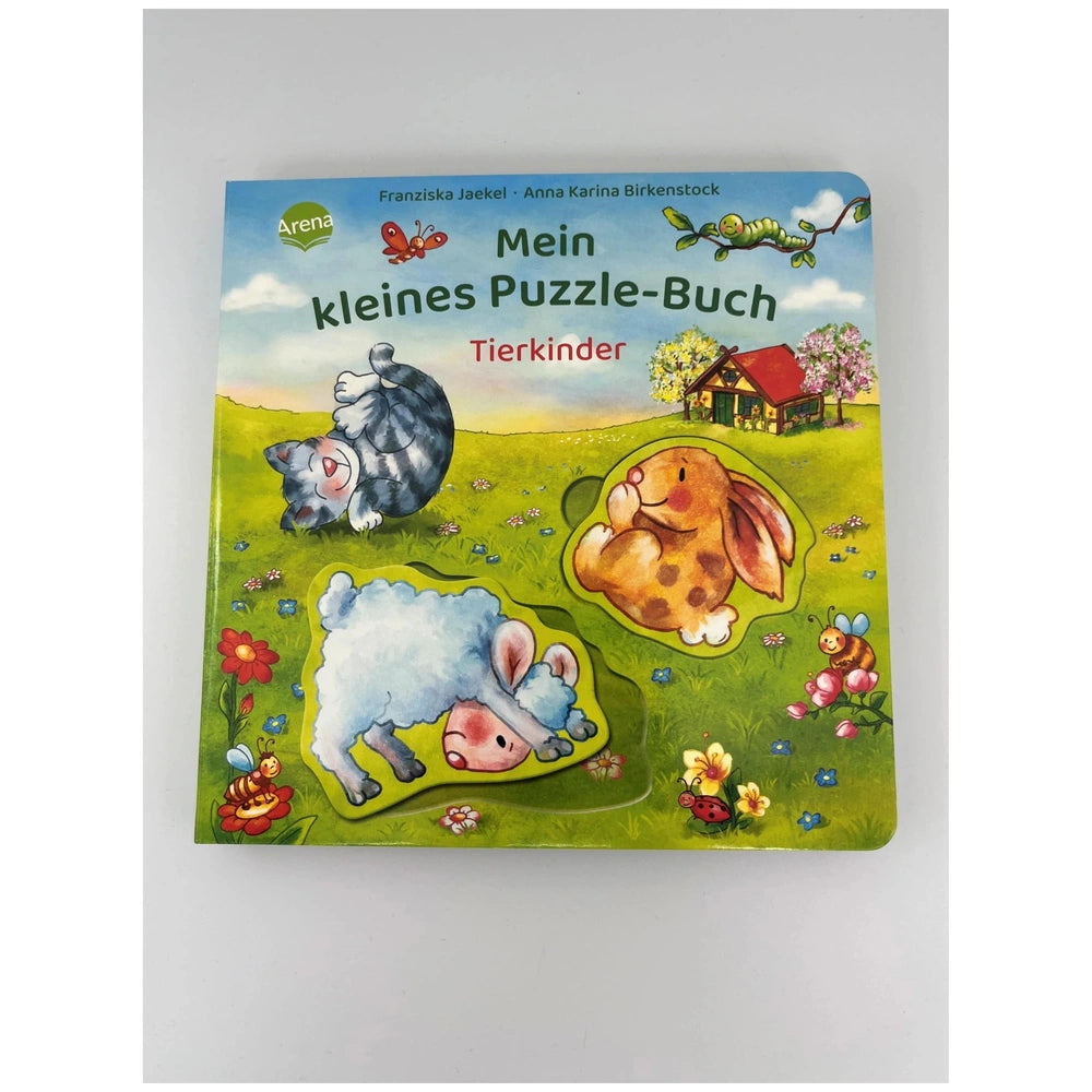 ARENA - Mein kleines Puzzle-Buch cover featuring cartoon animals in a colorful pastoral scene, perfect for children.
