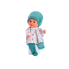 Asi Dolls Bomboncin, 20 cm, with blue eyes, blonde hair, green shorts, patterned shirt, and matching hat, sitting pose.