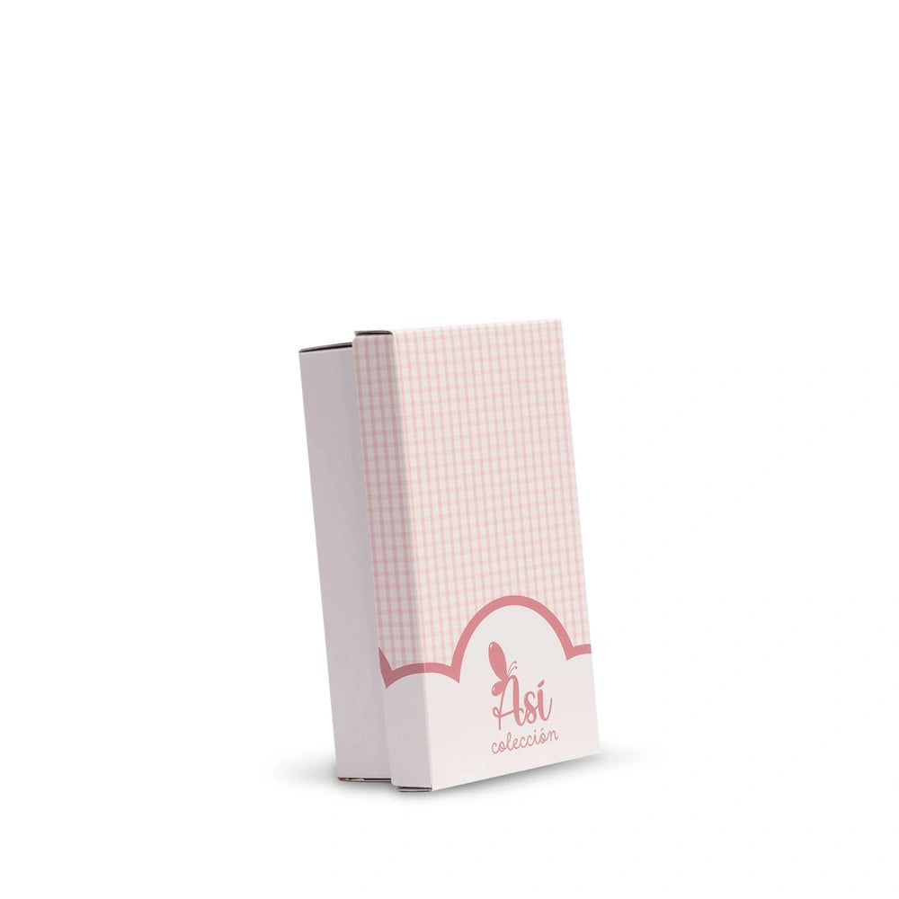 Pink checkered ASI Dolls packaging box with logo, standing upright against a white background.