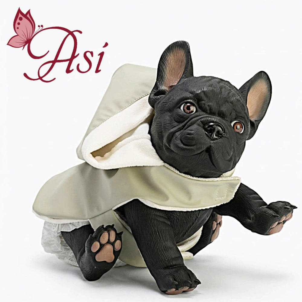 ASI Dolls Nono the Bulldog is a plush toy in a green raincoat, showcasing its expressive eyes and black fur.