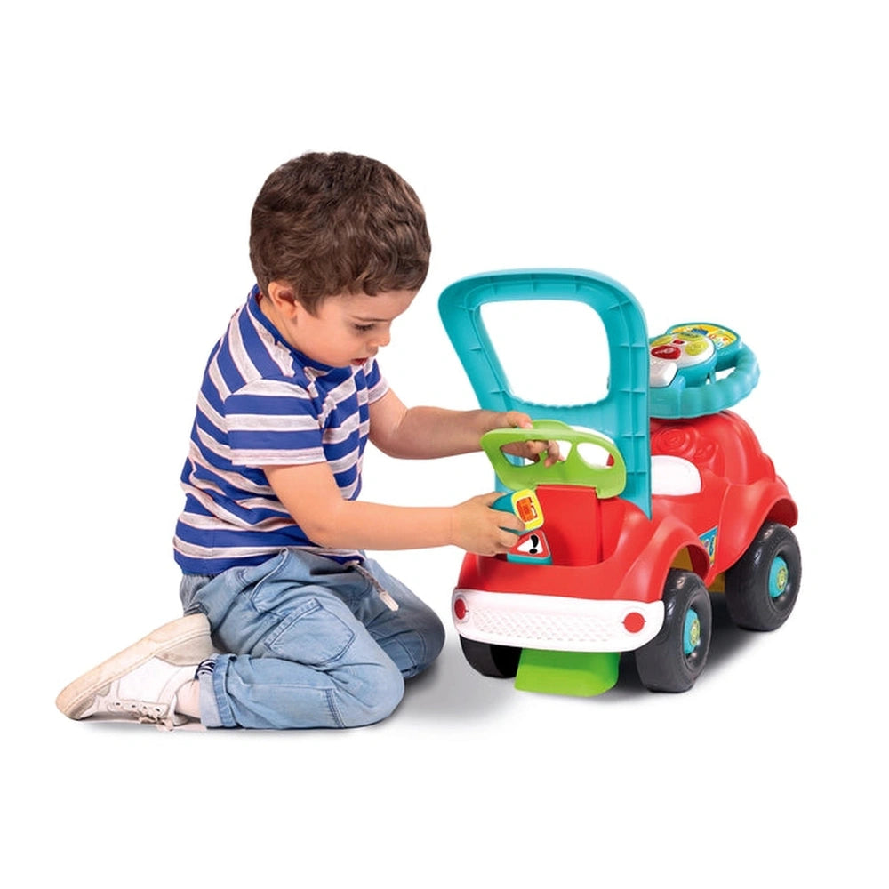 Baby Clementoni's Nicolo Go Go 3 In 1 Riding Toy is a colorful red and green car being played with by a young child.