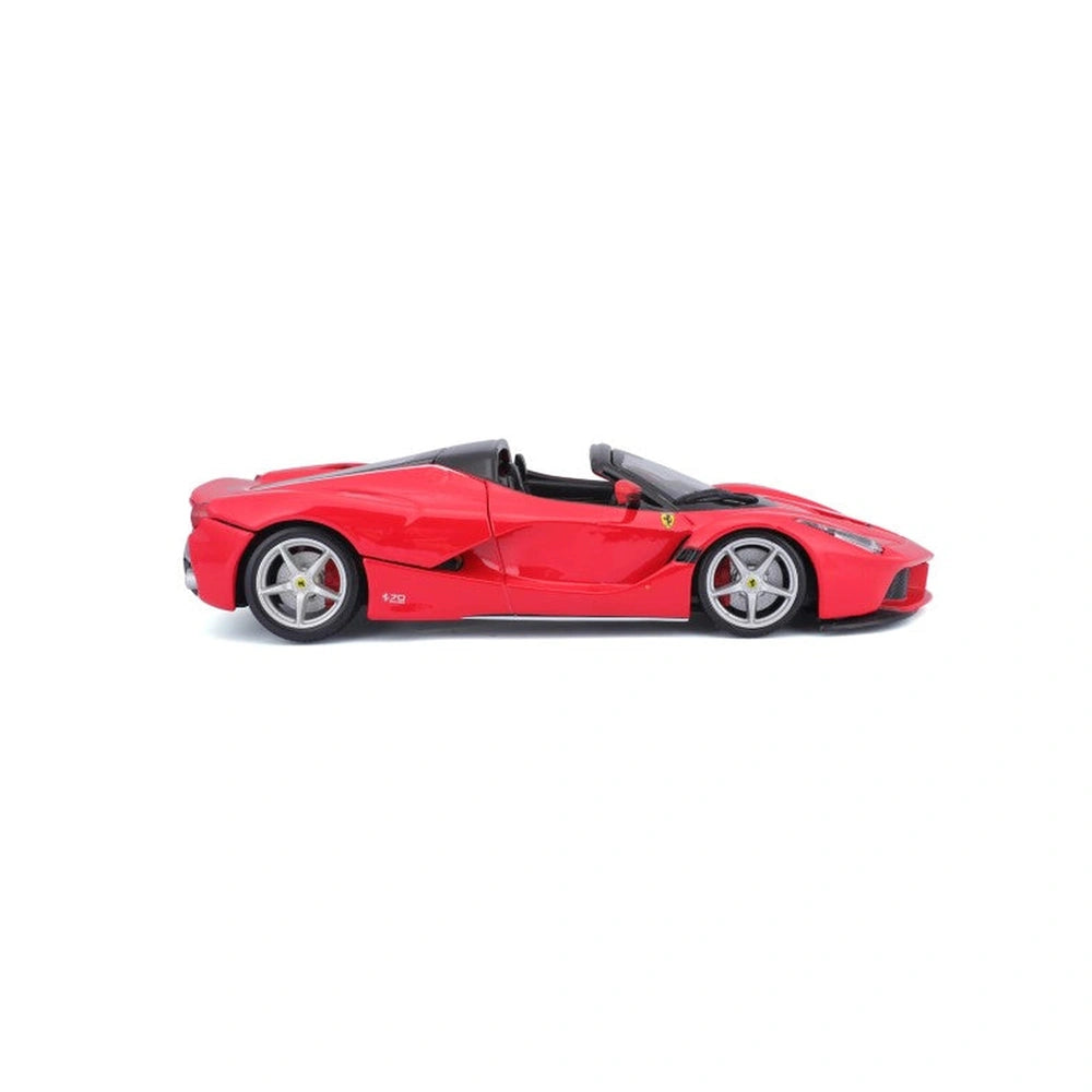 Ferrari La Ferrari Aperta 1:24 model in glossy red with black roof, tinted windows, and silver hubcap wheels.