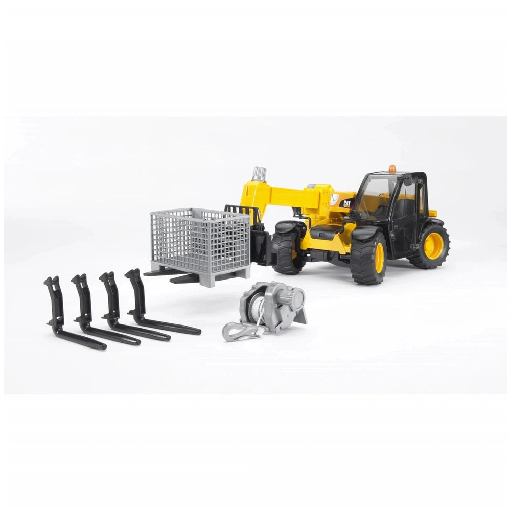 Yellow Bruder Cat Telehandler toy with detachable tool attachments, including a silver cage and black forks, on a white background.