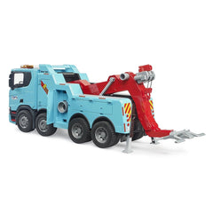 Blue and red Bruder Scania Super 560R toy towing truck with detailed design and extendable crane arm.