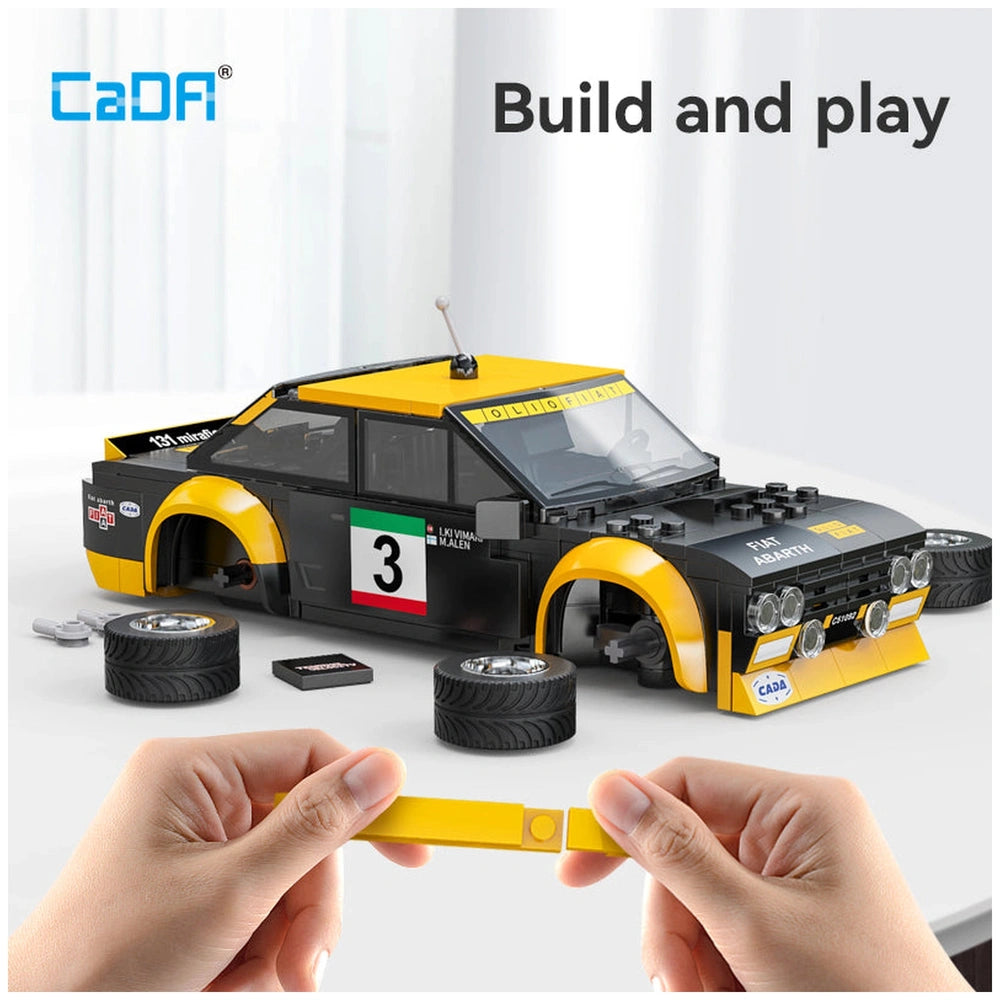CaDA Blade Fiat Abarth 131 toy features a shiny yellow and black plastic body with clear roof and rubber-like black wheels.