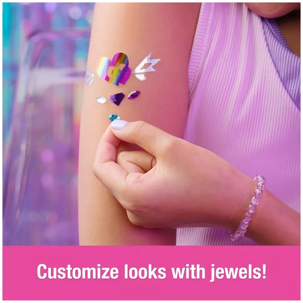 Cool Maker Shimmer Me Body Art Set showcases a glittery temporary tattoo on an arm, complemented by a sparkly object in hand.