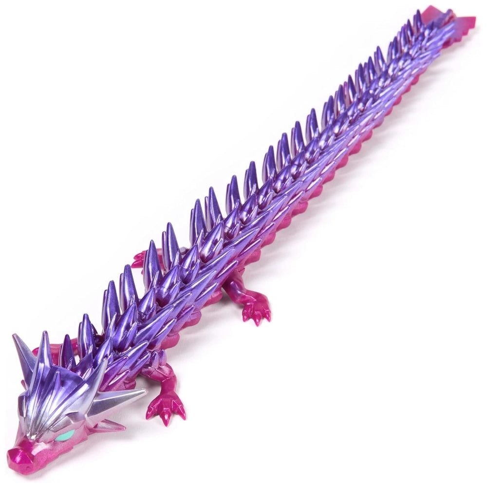 Articulated dragon figure with a glossy purple body, silver accents, and prominent spikes, set against a plain white backgrou