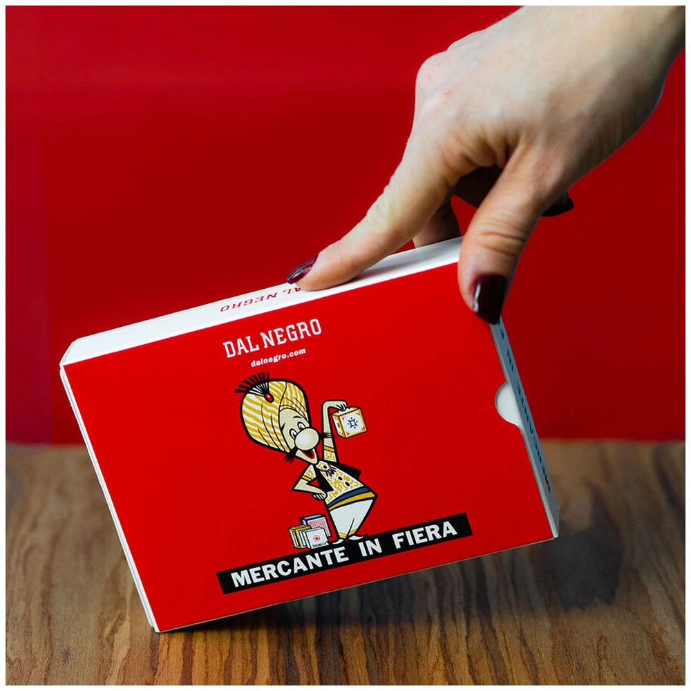Dal Negro - Il Mercante In Fiera deck in red and white cardboard, featuring an open box with a character graphic on the side.