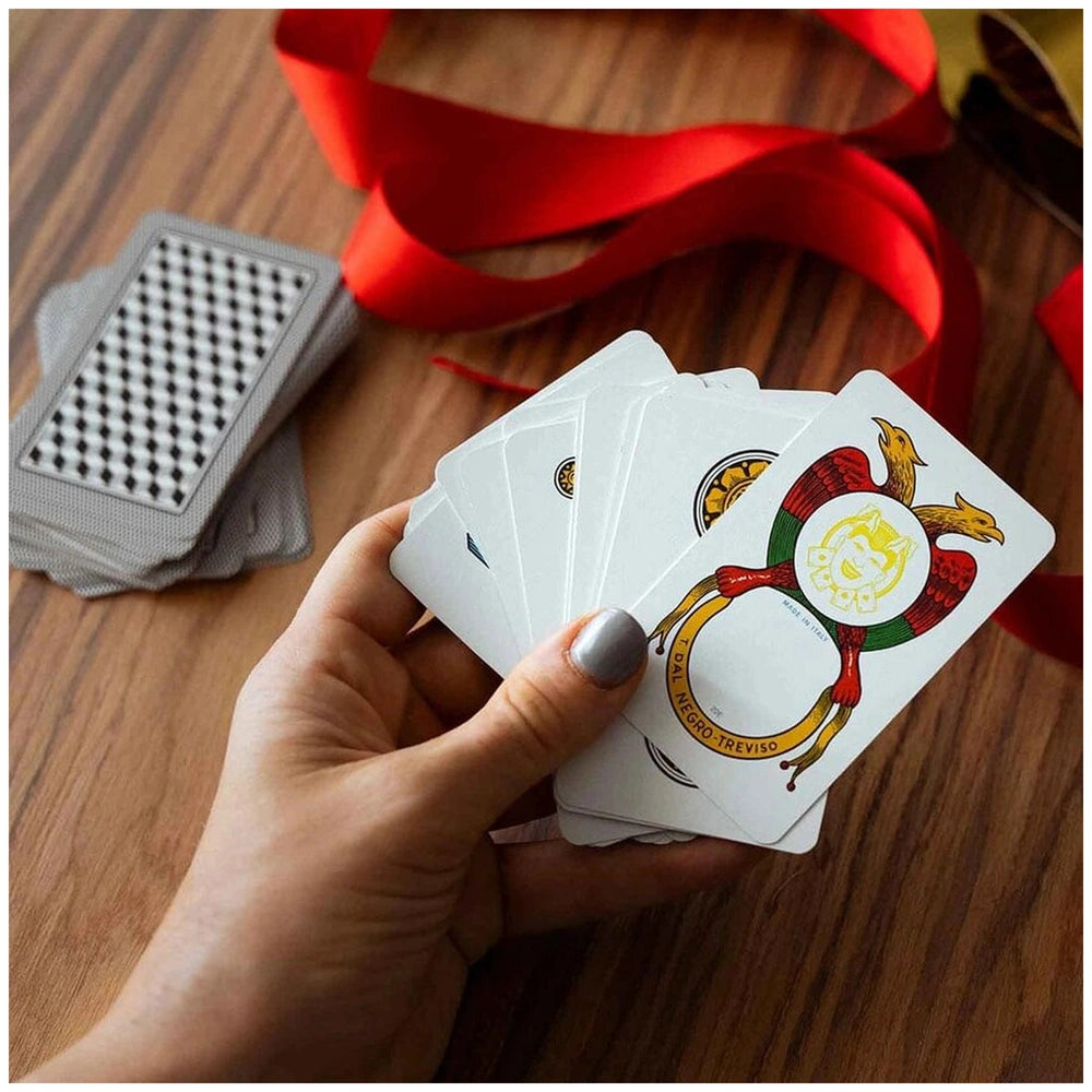 Dal Negro Neapolitan Pro Cards N.82 in red case with 40 plastic cards, displayed on a wooden surface with a red ribbon.