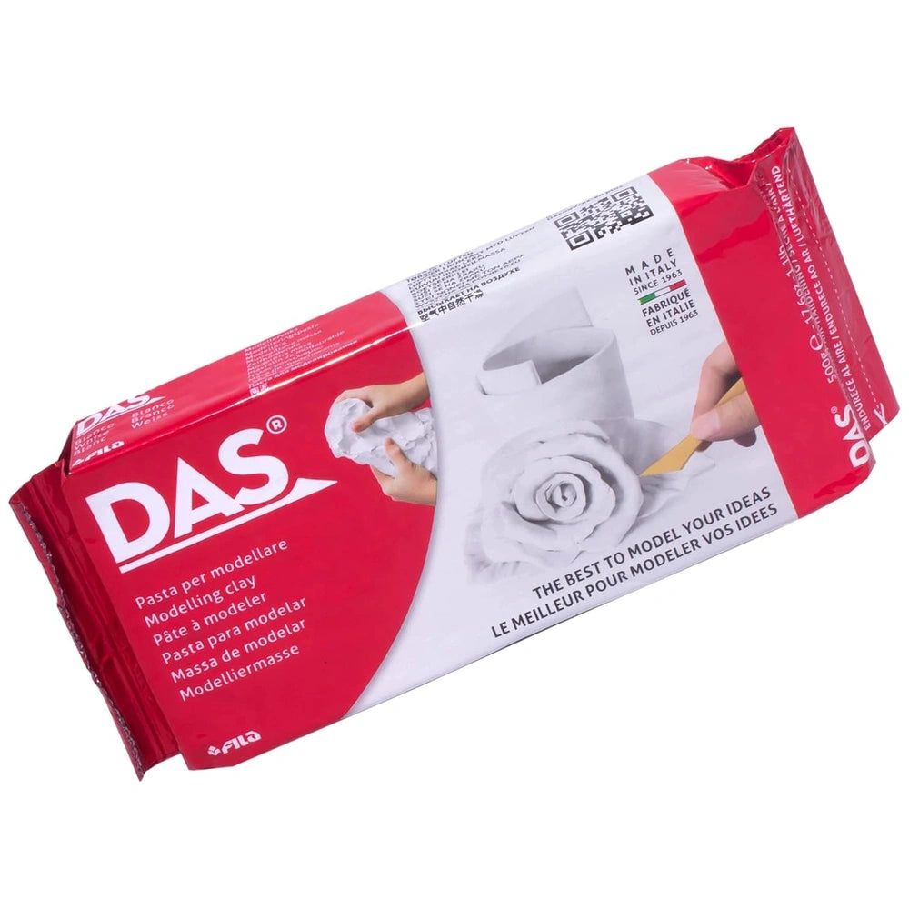 DAS Modeling Clay in white 500g packaging with red background, featuring text and a logo, and an image of a hand holding tool