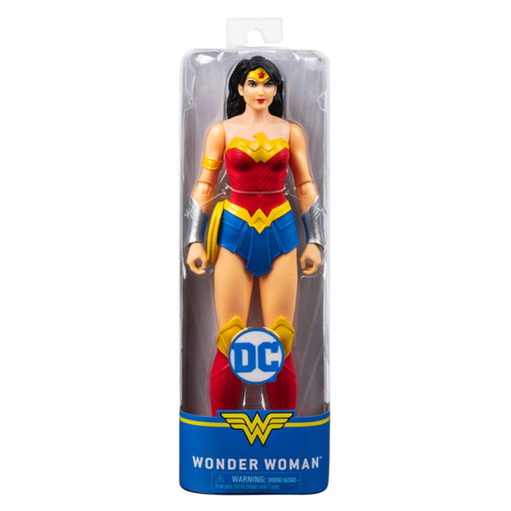 Wonder Woman action figure in red, blue, and yellow, encased in clear plastic packaging with warning label.