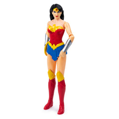 Wonder Woman action figure stands confidently in a red and blue bodysuit, featuring a yellow belt and red boots.