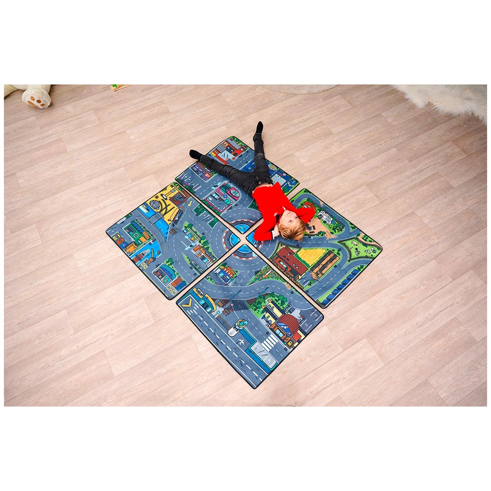 Dickie Playmat 80 x 70 cm features a colorful design, with a person in a red top lying on a light hardwood floor.