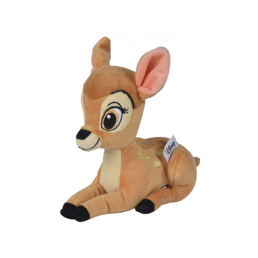 Disney Classic plush deer toy in soft brown fabric, sitting upright with a cuddly texture and a tag on its ear.