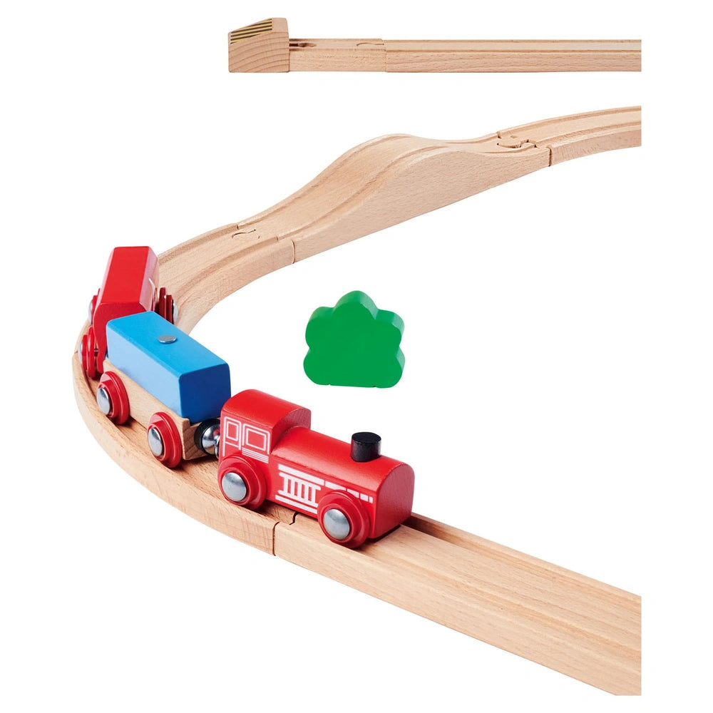 Eichhorn Train Track with Bridge Playset featuring colorful wooden train cars on light wooden tracks.