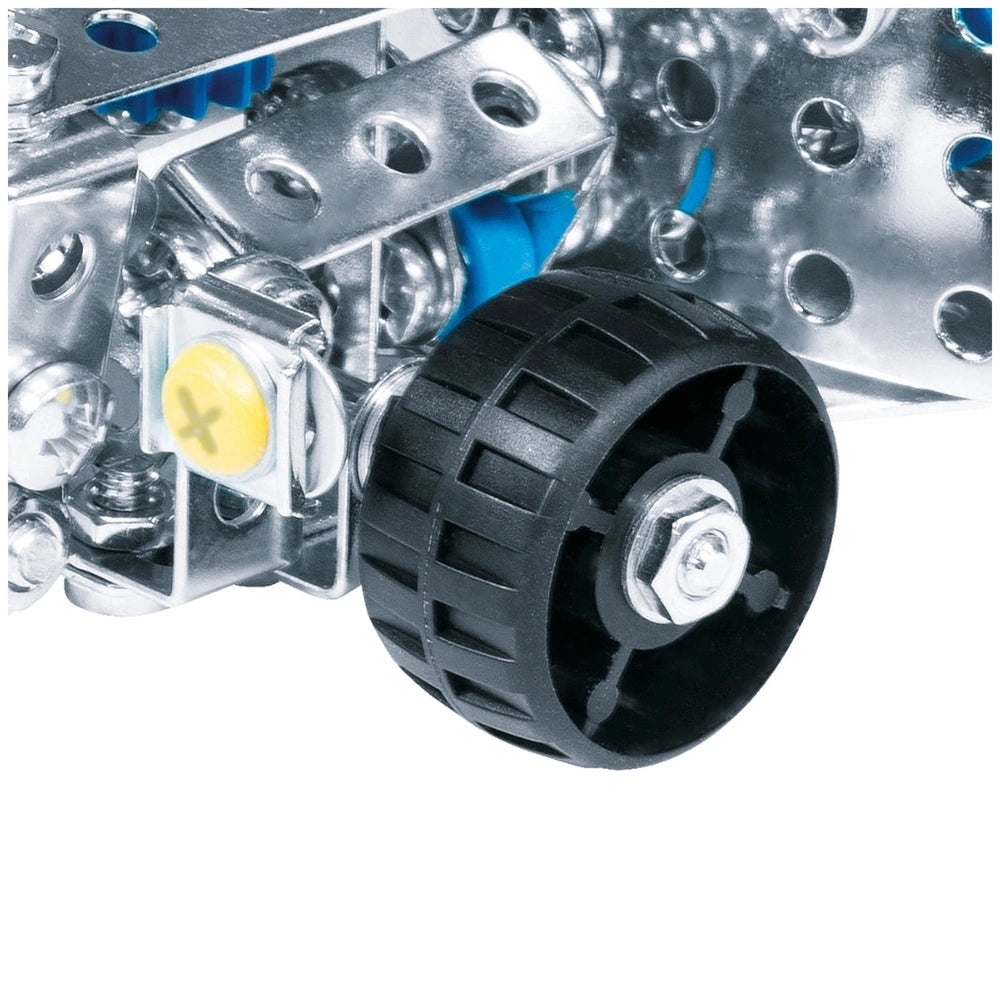 Eitech Speed Racer construction set features a central yellow button surrounded by shiny silver metal and textured black rubb