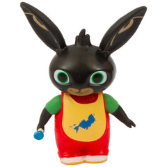 GOLDEN BEAR toy figure features a shiny black head, red body, and gold-striped ears, made from plastic with a matte finish.