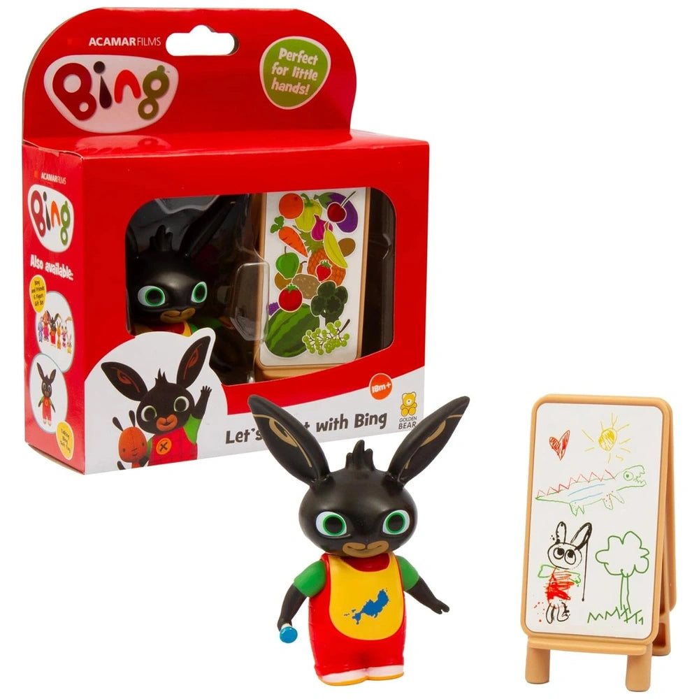 GOLDEN BEAR Lets Paint with Bing toy figure in red and yellow clothing, with green eyes, alongside a whiteboard on a wooden e