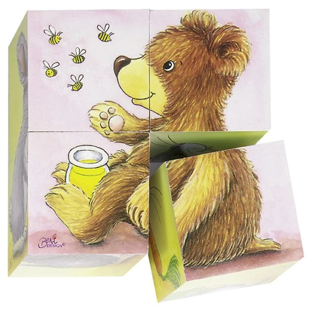 Gollness Baby Animals Cube Puzzle packaging features a smiling cartoon bear with a bee on its paw against a soft pink backgro