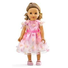 Doll Miss Butterfly features light beige skin, glossy light brown hair, and a pink dress with butterfly patterns.