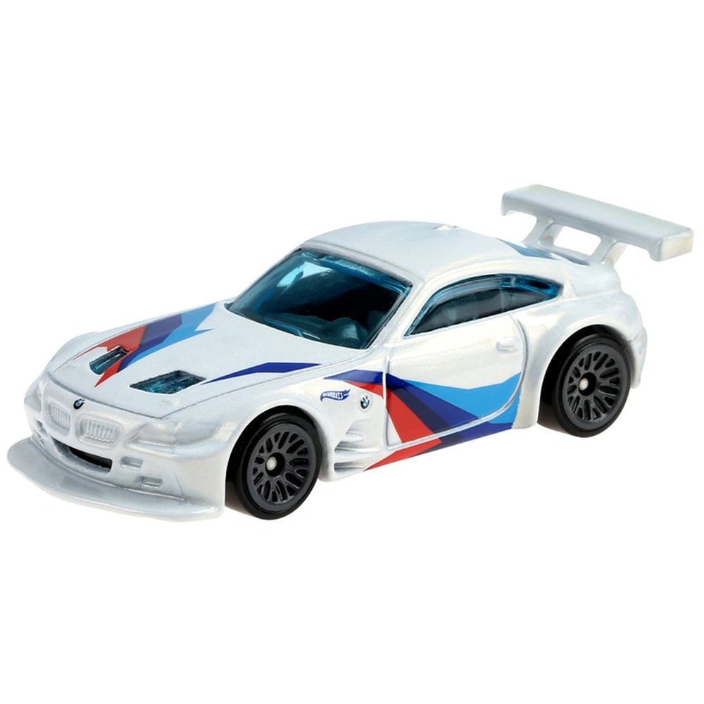 Hot Wheels die-cast racing vehicle in white with glossy hood, blue, red, and black stripes, featuring tinted windows and a re