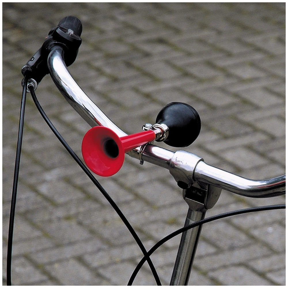 Johntoy bicycle horn in red mounted on silver bicycle handlebars with black seat and handlebar tape for outdoor play.