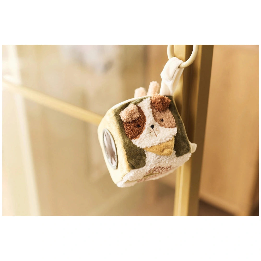 Jollein Activity Cube features a brown and white design with a friendly face, ears, and interactive button for baby play.