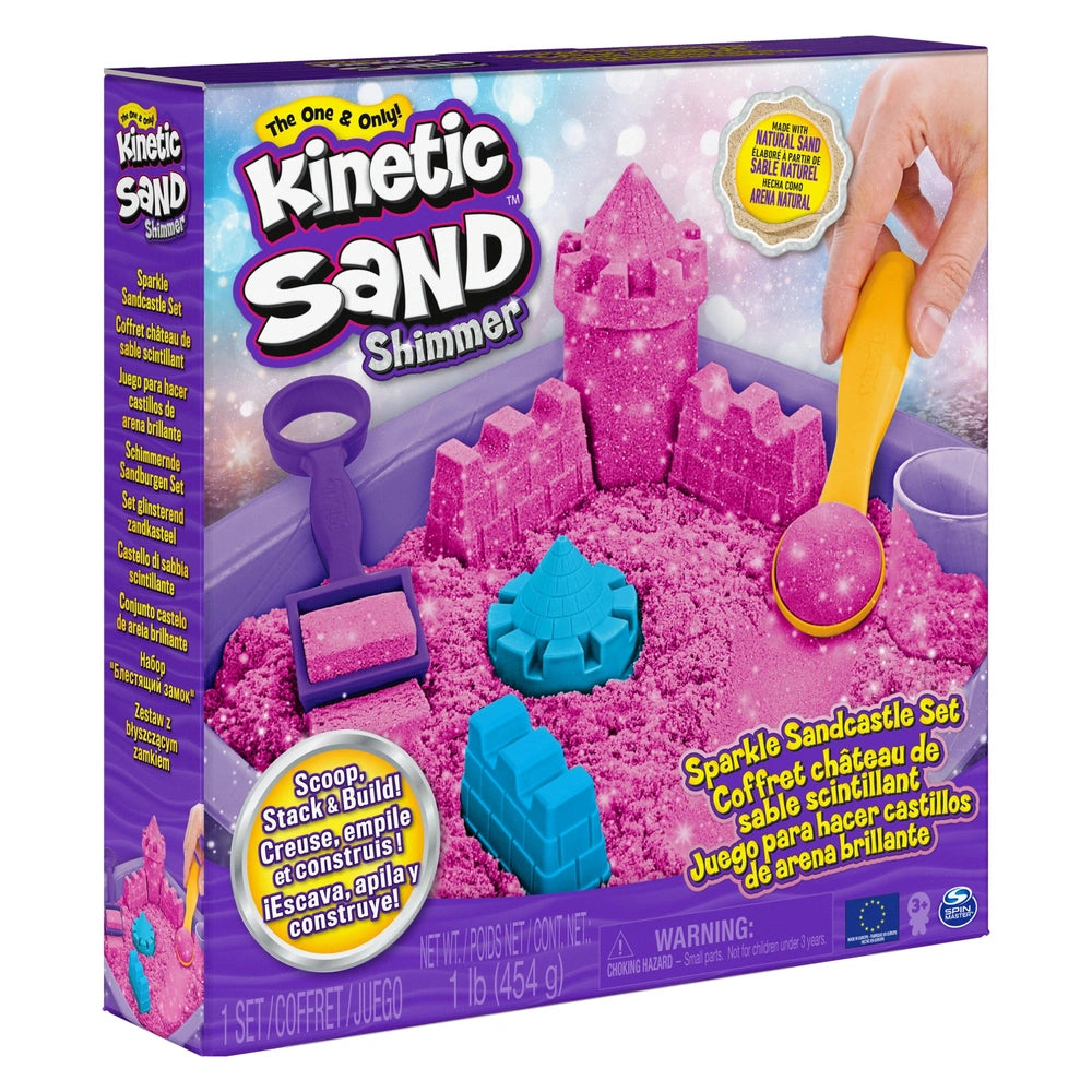 Kinetic Sand Shimmer Sparkle Sandcastle Set features a pink castle, blue spade, and yellow spoon in vibrant packaging.
