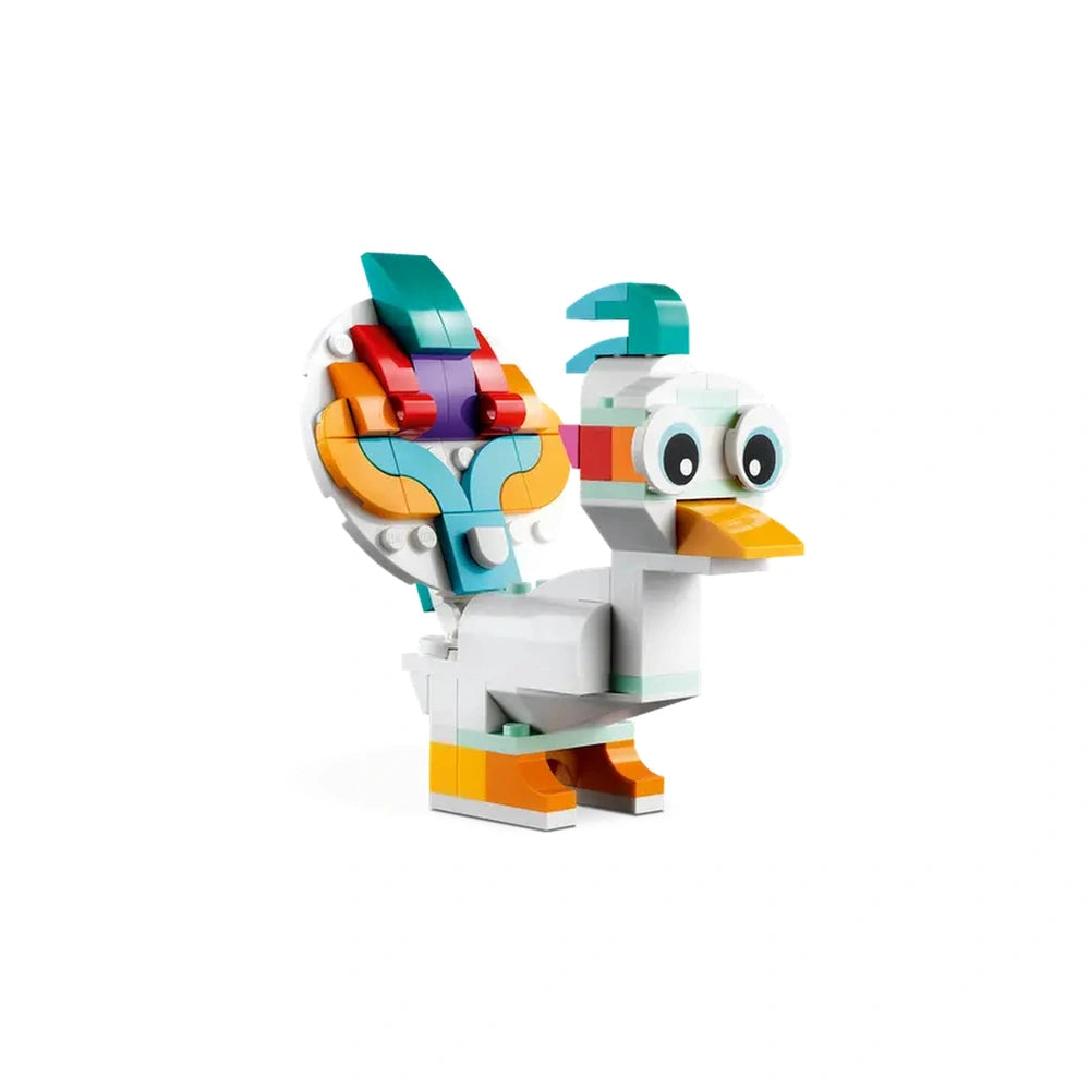Colorful LEGO Creator bird figure with a white body, orange beak, teal crest, and vibrant patterned tail, standing on a white base.