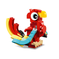 Vibrant red LEGO bird figure with expressive eyes, featuring colorful wings and a playful design, set against a white background.