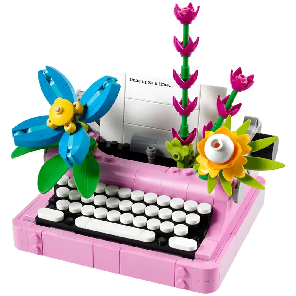 Colorful LEGO® Creator Typewriter features a moving keyboard, bright flowers, and a sheet of paper reading "Once upon a time...