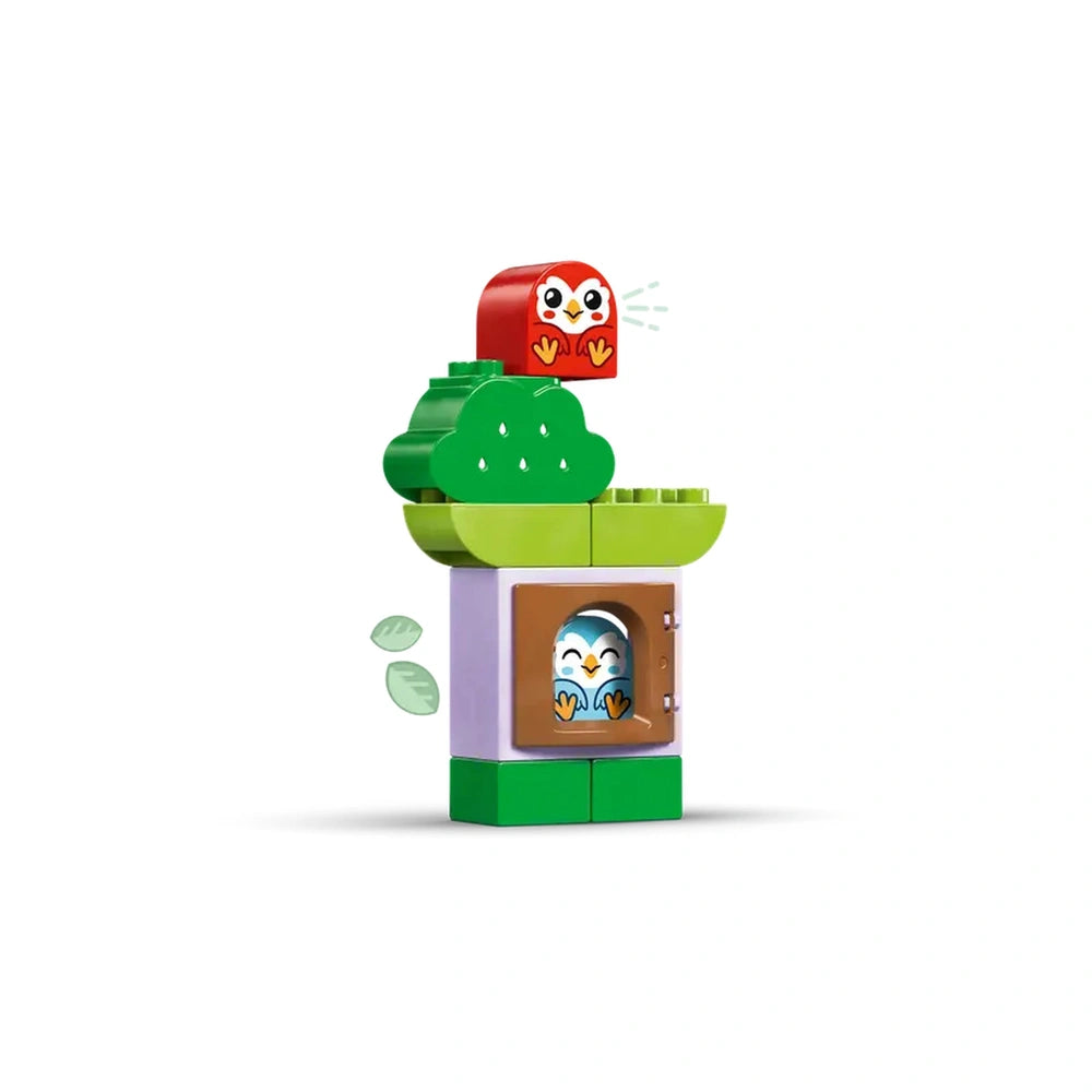 Colorful LEGO® DUPLO® Balancing & Stacking Tree set featuring a red owl on top, green leaves, and a playful owl peeking from a door.