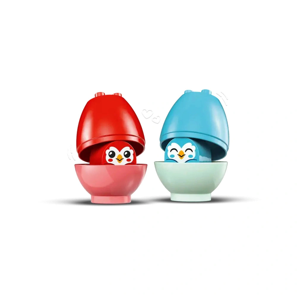 Colorful LEGO® DUPLO® owl figures nestled in red and blue egg-shaped containers, promoting play and learning.