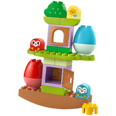 Colorful LEGO® DUPLO® Balancing & Stacking Tree with a green canopy, red and blue owl figures, and a door opening at the base.
