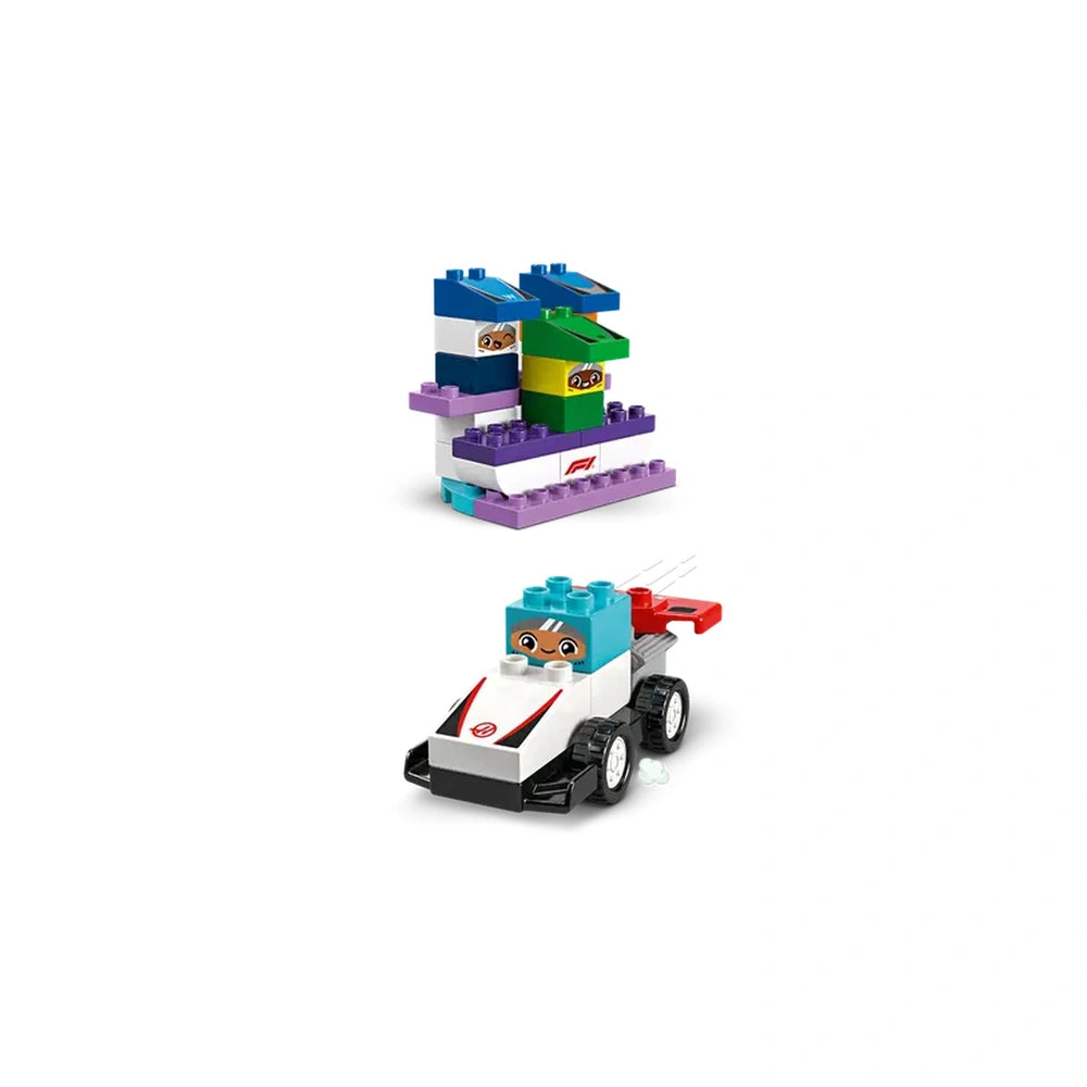 Colorful Lego Duplo F1® Team Race Cars and Drivers set featuring a playful race car and a multi-colored podium structure with driver figures.