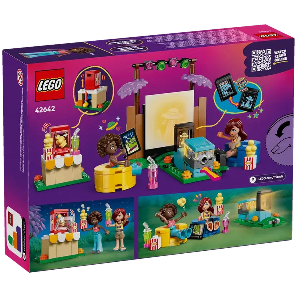 LEGO Friends Friendship Movie Night playset featuring two minidolls, a mini projector, popcorn stand, and colorful accessories against a vibrant background.