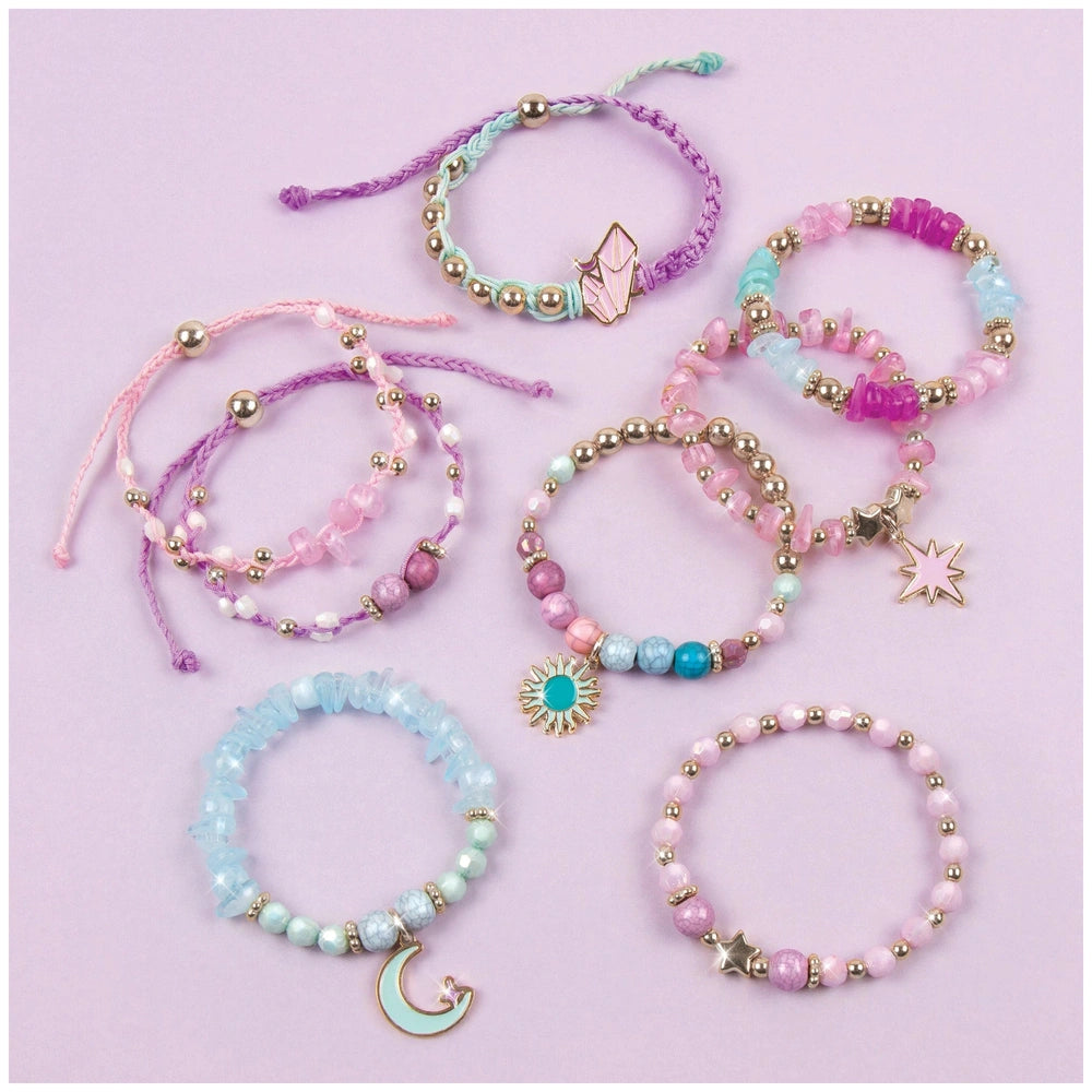 Celestial Stones bracelets featuring pink, purple, and blue threads with silver and colorful beads arranged closely together.