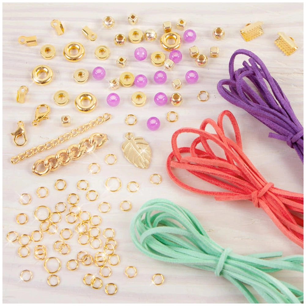 Gold link suede bracelets featuring gold-colored metal components and colorful plastic beads in pink, purple, and clear.